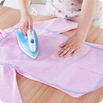 Mesh ironing pad to protect the protective clothing board