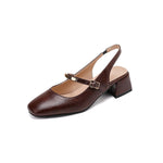 Casual Block-heeled Sandals With A Square Toe Featuring Rivet Accents And A Strap-over Design