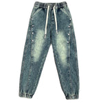 Mens Washed Denim Jeans With A Vintage Design, Featuring Button Detailing And A Tapered Leg