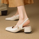 Casual Block-heeled Sandals With A Square Toe Featuring Rivet Accents And A Strap-over Design