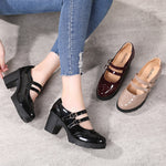 Chunky-heeled Patent Leather Wedge Sandals With A Strap-and-buckle Closure